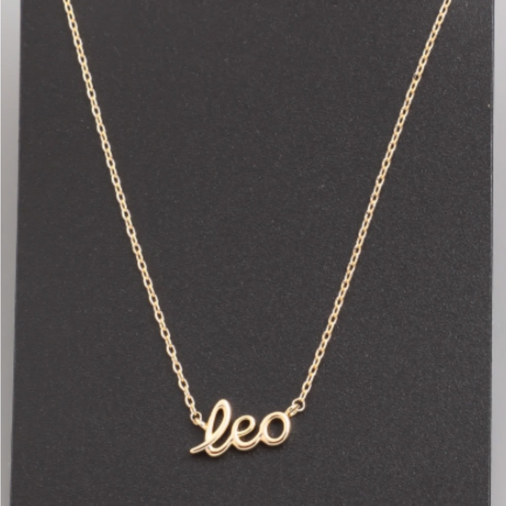 Gold zodiac pendant necklace in a fun font.  Makes a great gift.  18" - Picture 5 of 12